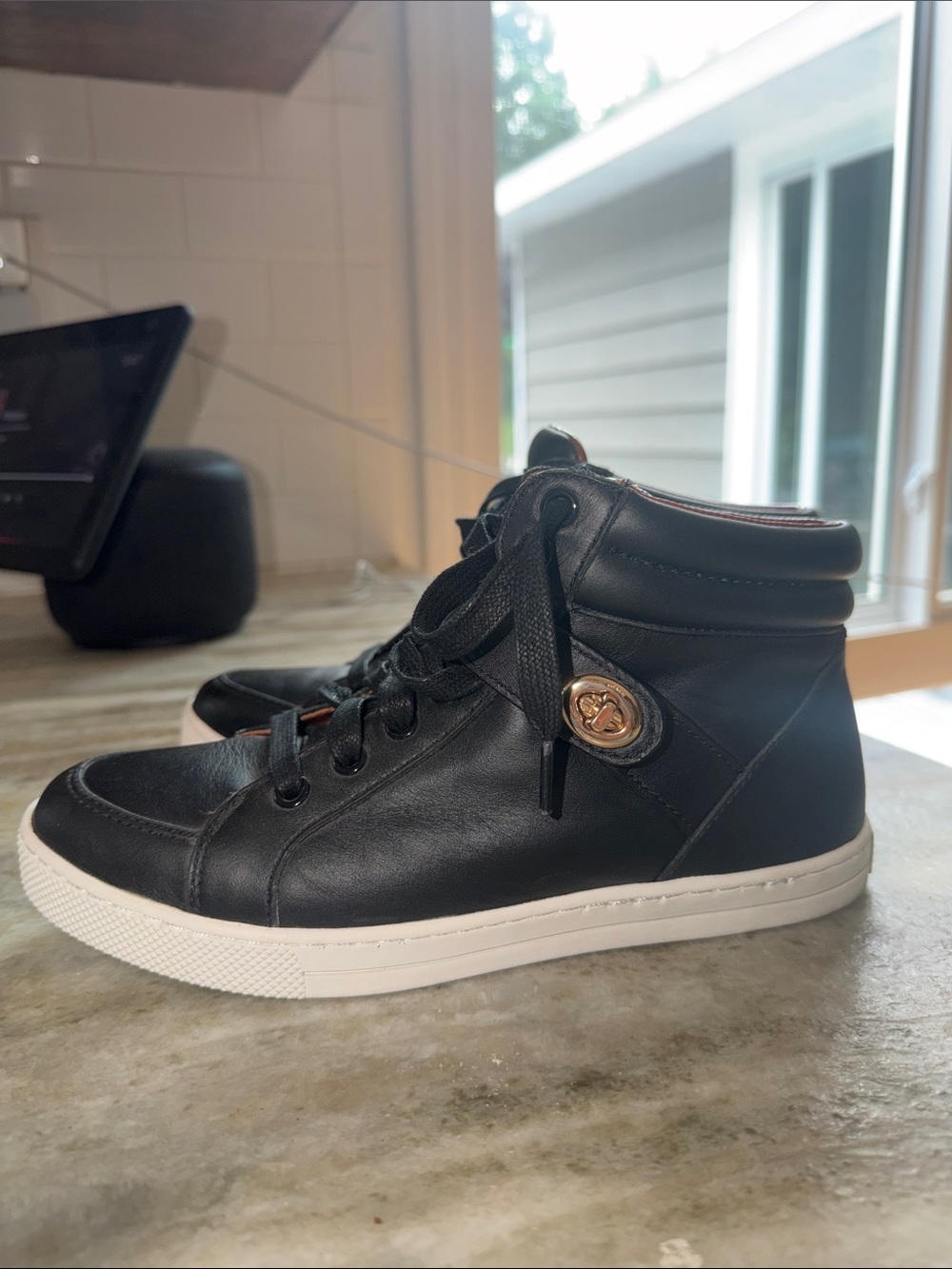 Coach Black Leather High-Top Sneakers with Gold Logo